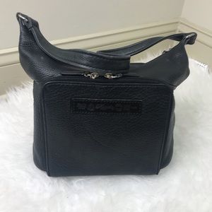 Black FOSSIL leather handbag with shoulder strap.